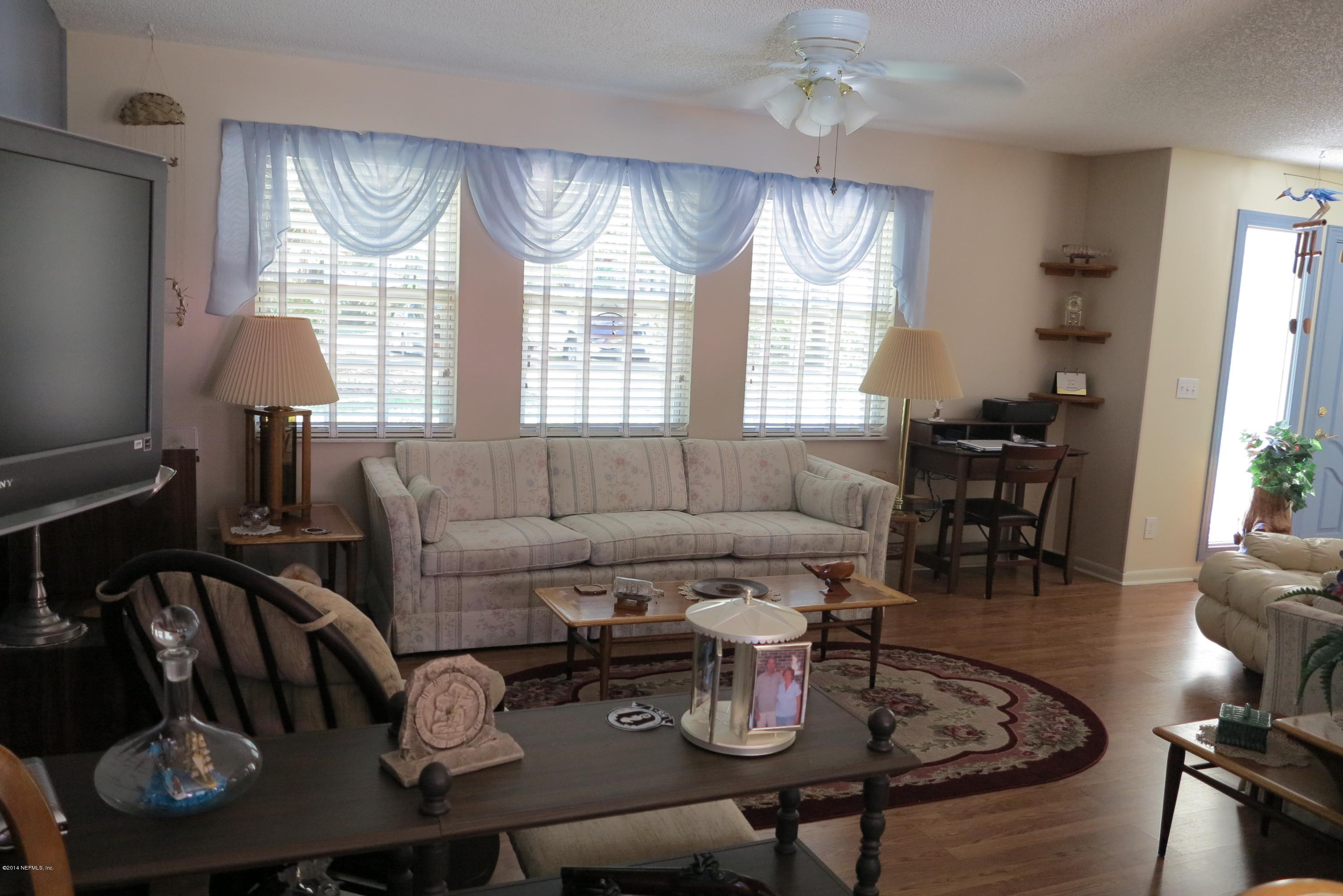 2095 Orange Picker Road Jacksonville, FL 32223 - Photo 9 of 67 LR windows overlooking front huge yard