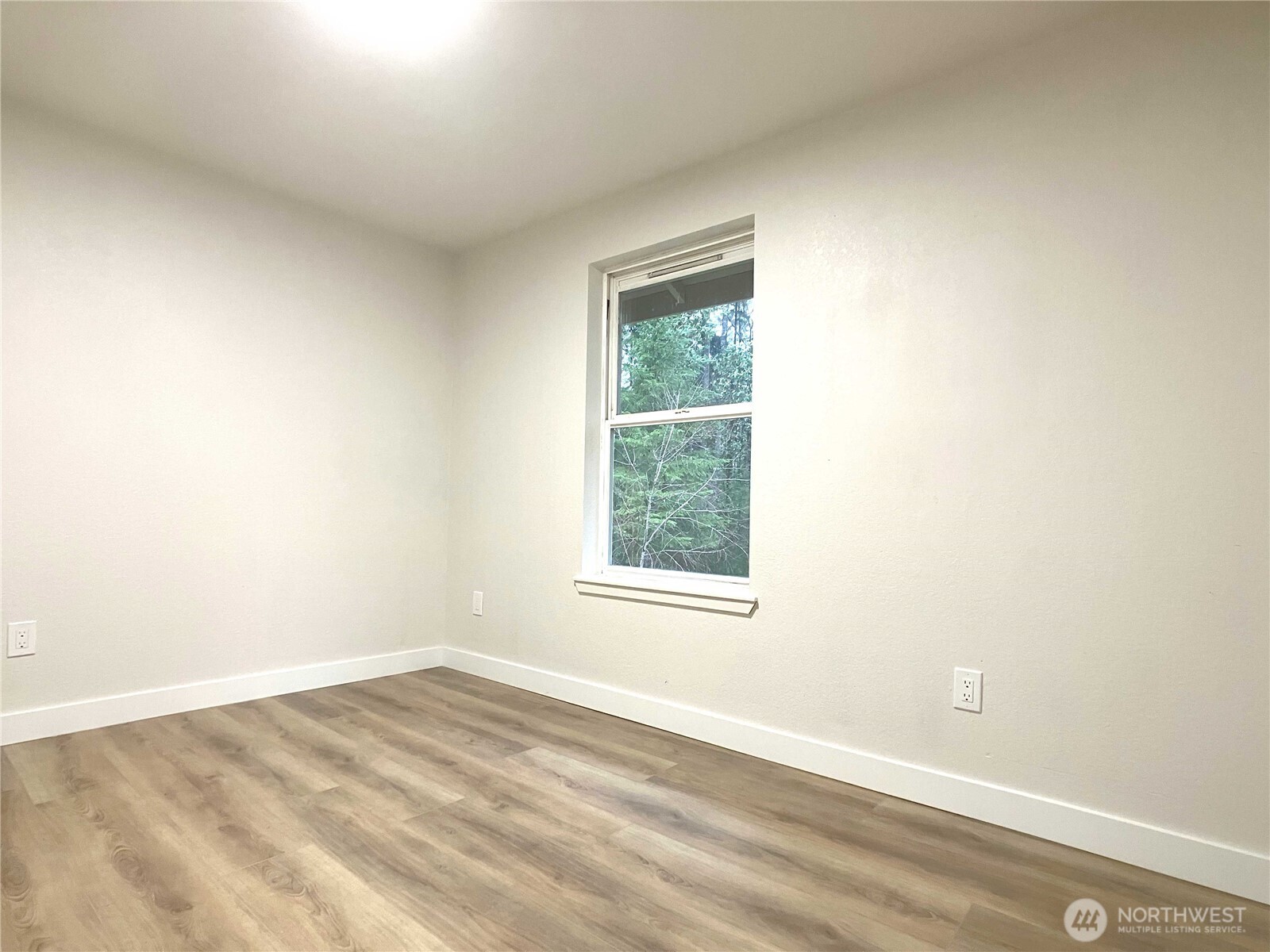 1471 Southeast Binns Swiger Loop Road Shelton, WA 98584 - Photo 17 of 25 an empty room with a window