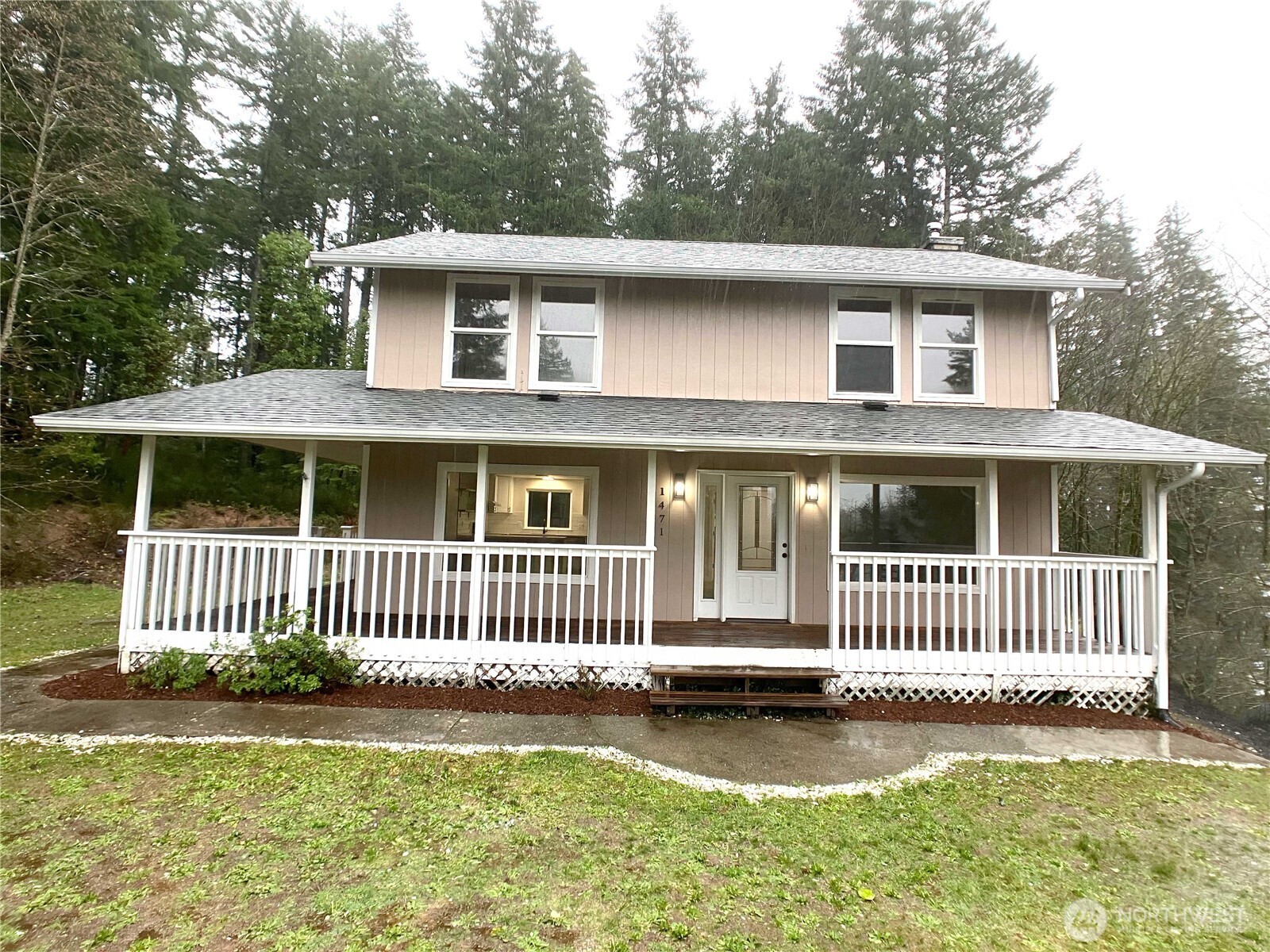 1471 Southeast Binns Swiger Loop Road Shelton, WA 98584 - Photo 23 of 25 a front view of a house with a garden and yard