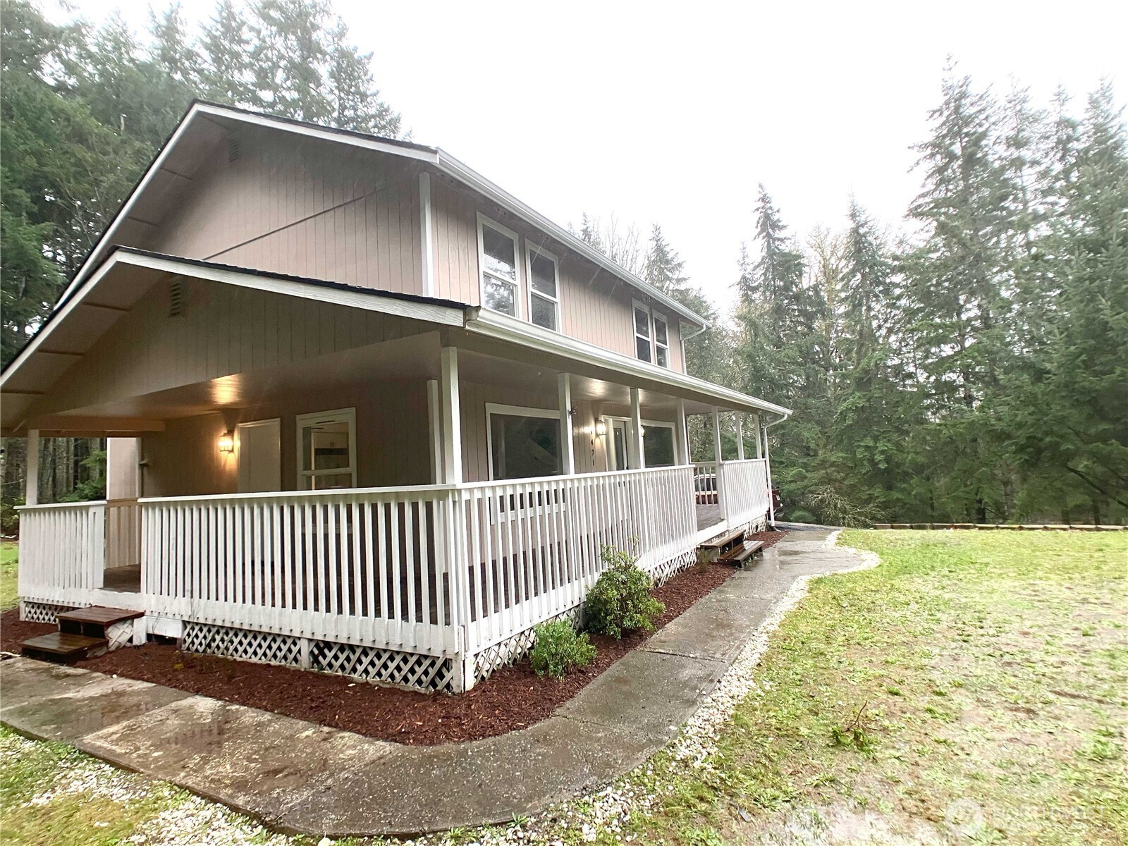 1471 Southeast Binns Swiger Loop Road Shelton, WA 98584 - Photo 25 of 25 a side view of a house with a yard