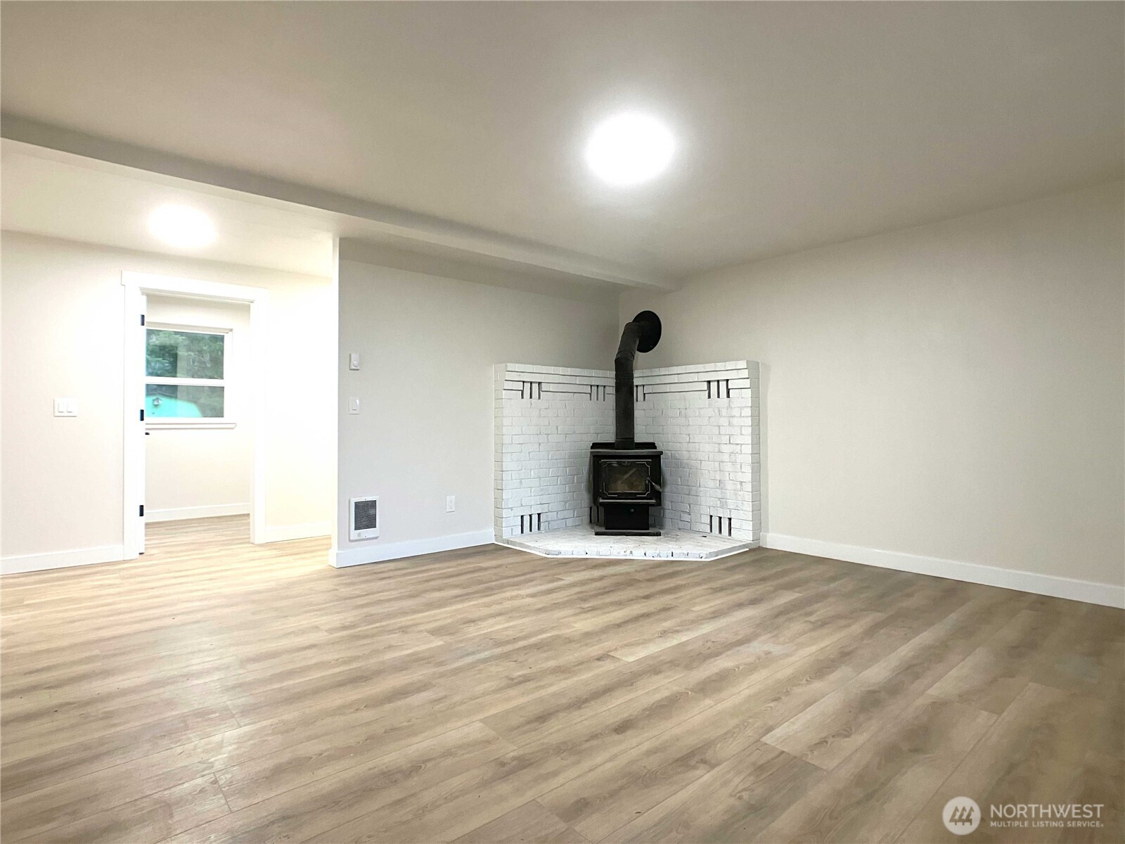 1471 Southeast Binns Swiger Loop Road Shelton, WA 98584 - Photo 3 of 25 a view of empty room with wooden floor