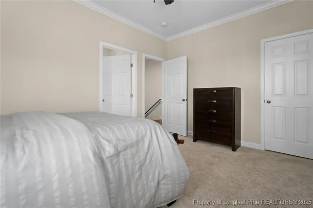 a view of bedroom with furniture and wooden floor