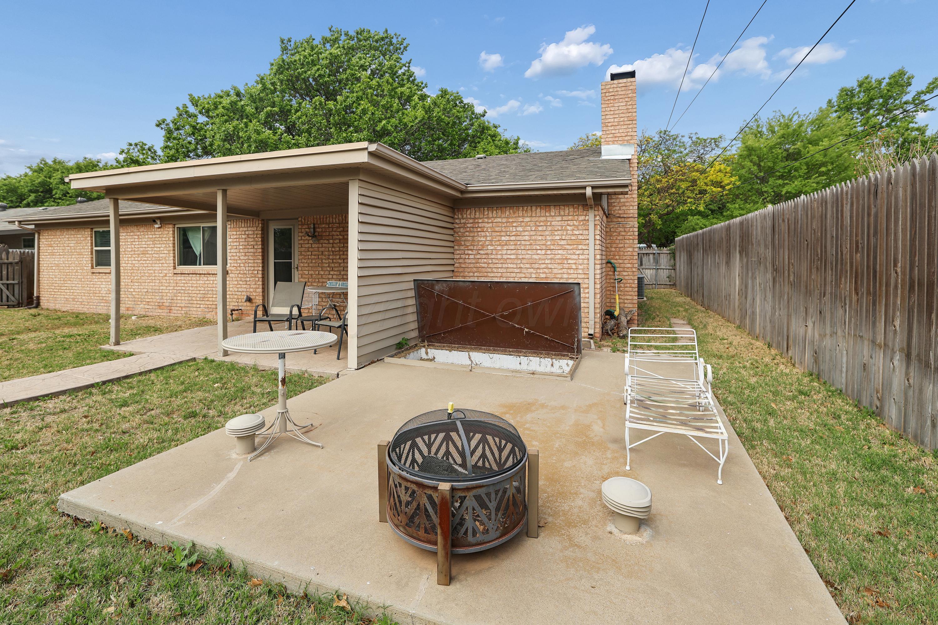 4433 Summit Circle Amarillo, TX 79109 - Photo 24 of 26 25-Patio with Storm Cellar