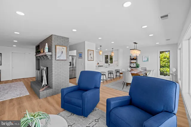 a kitchen with cabinets and stainless steel appliances