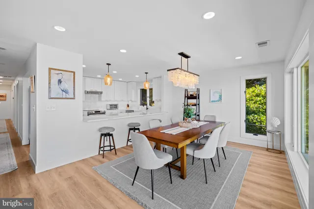 a bedroom with a bed and a lamp on table