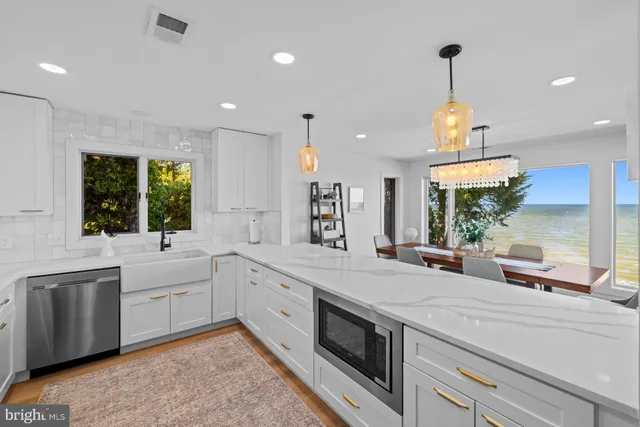 a living room with furniture and windows