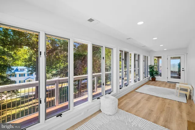 a bedroom with a bed and a night stand