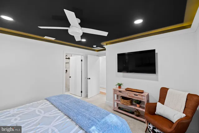 a view of a porch with chairs and backyard