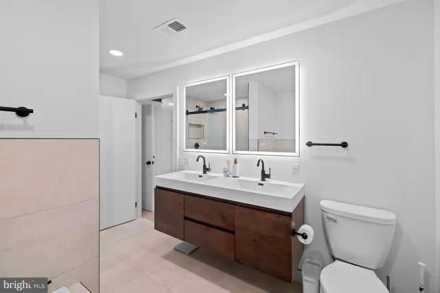 a view of a house with snow on the background