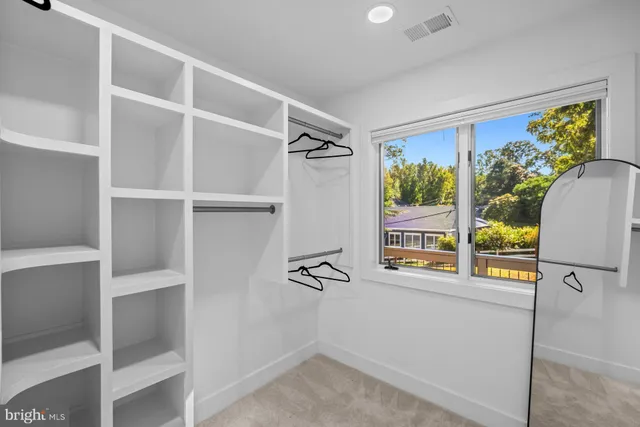 a view of swimming pool with outdoor seating