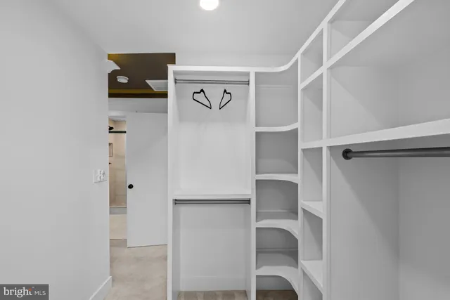 a view of a two chairs in the balcony