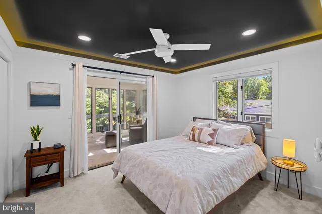 a view of balcony with wooden floor and fence