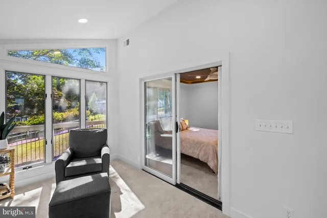 a outdoor space with patio the couches and a dining table with garden view