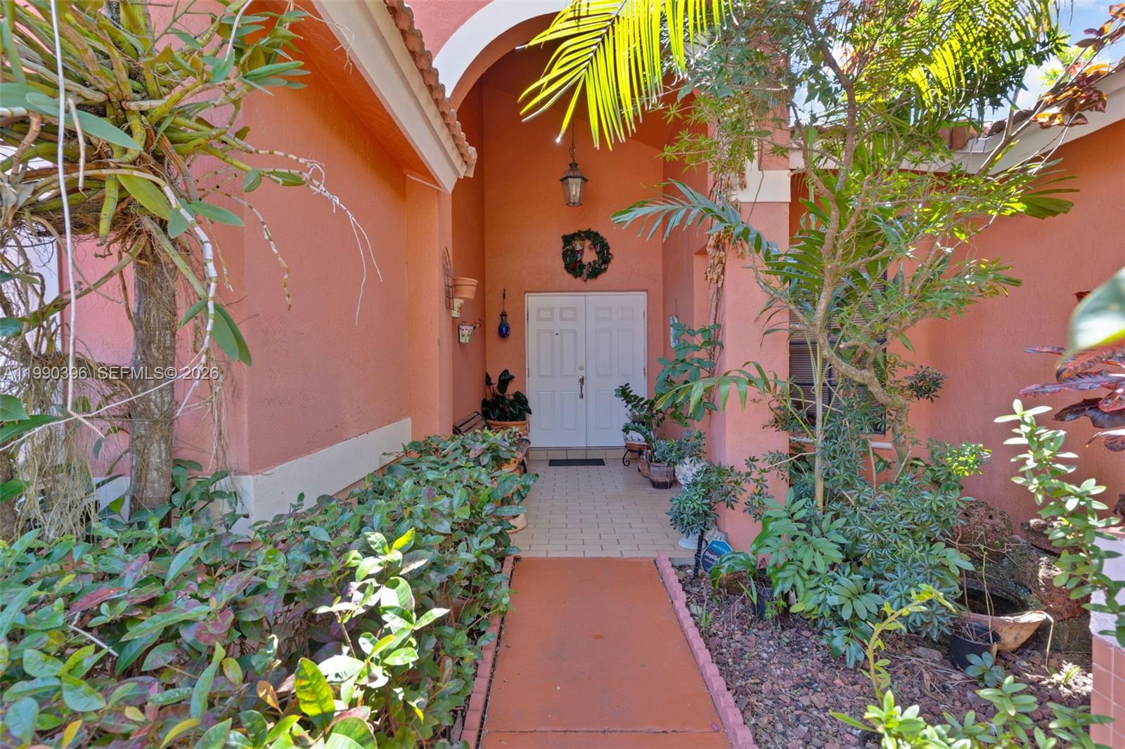 a backyard of a house with a garden