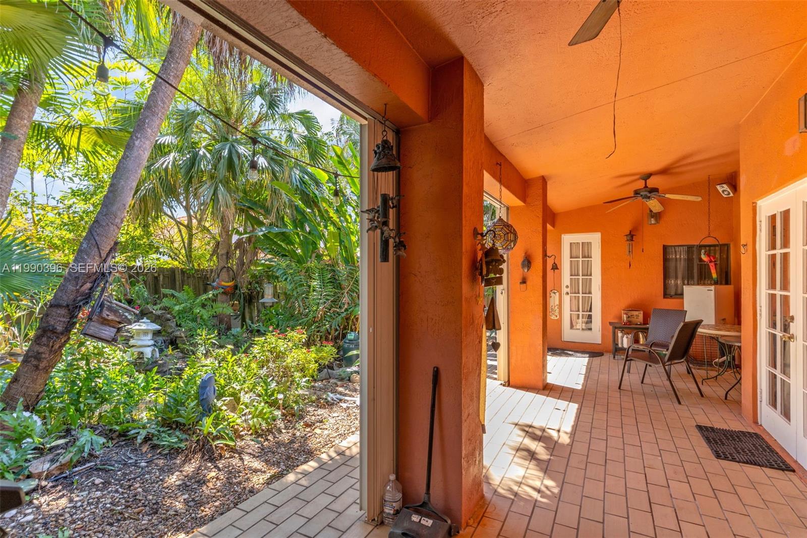 15012 Southwest 45th Lane Miami, FL 33185 - Photo 24 of 43 a view of living room and patio