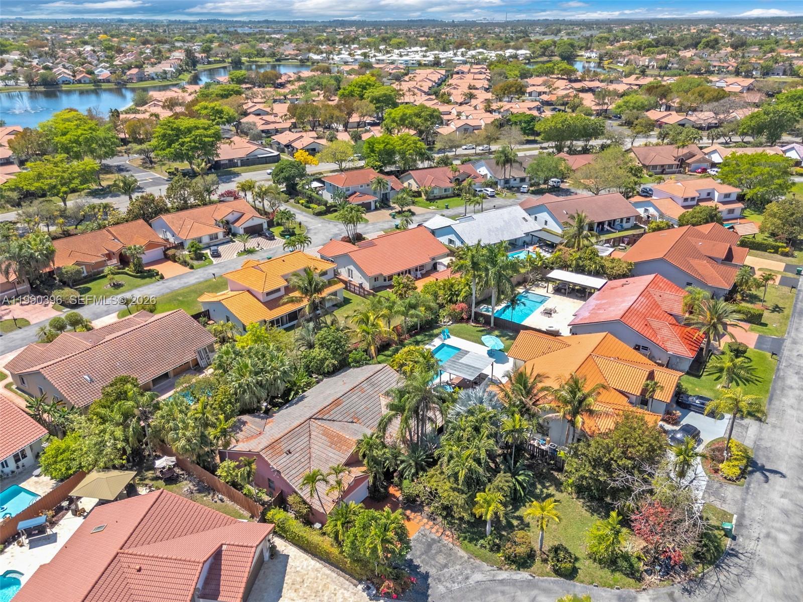 15012 Southwest 45th Lane Miami, FL 33185 - Photo 30 of 43 an aerial view of residential houses with outdoor space