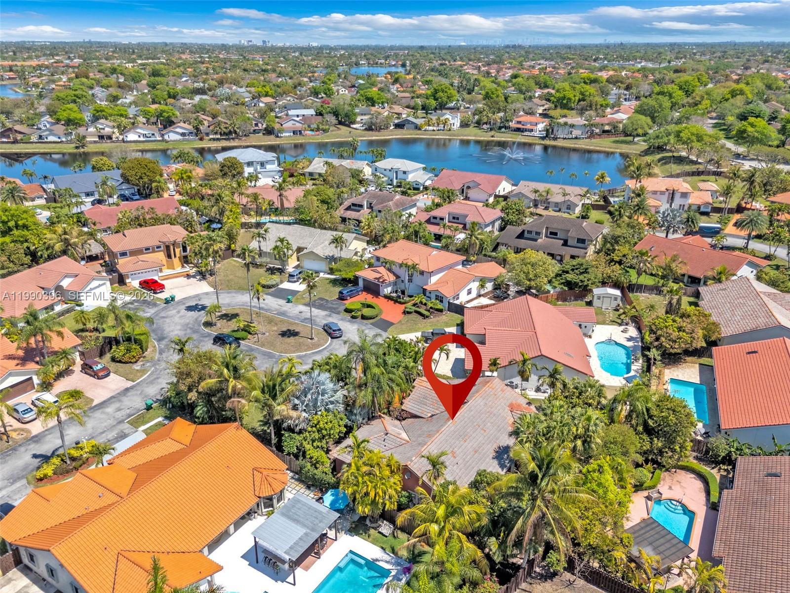 15012 Southwest 45th Lane Miami, FL 33185 - Photo 34 of 43 an aerial view of residential building and lake