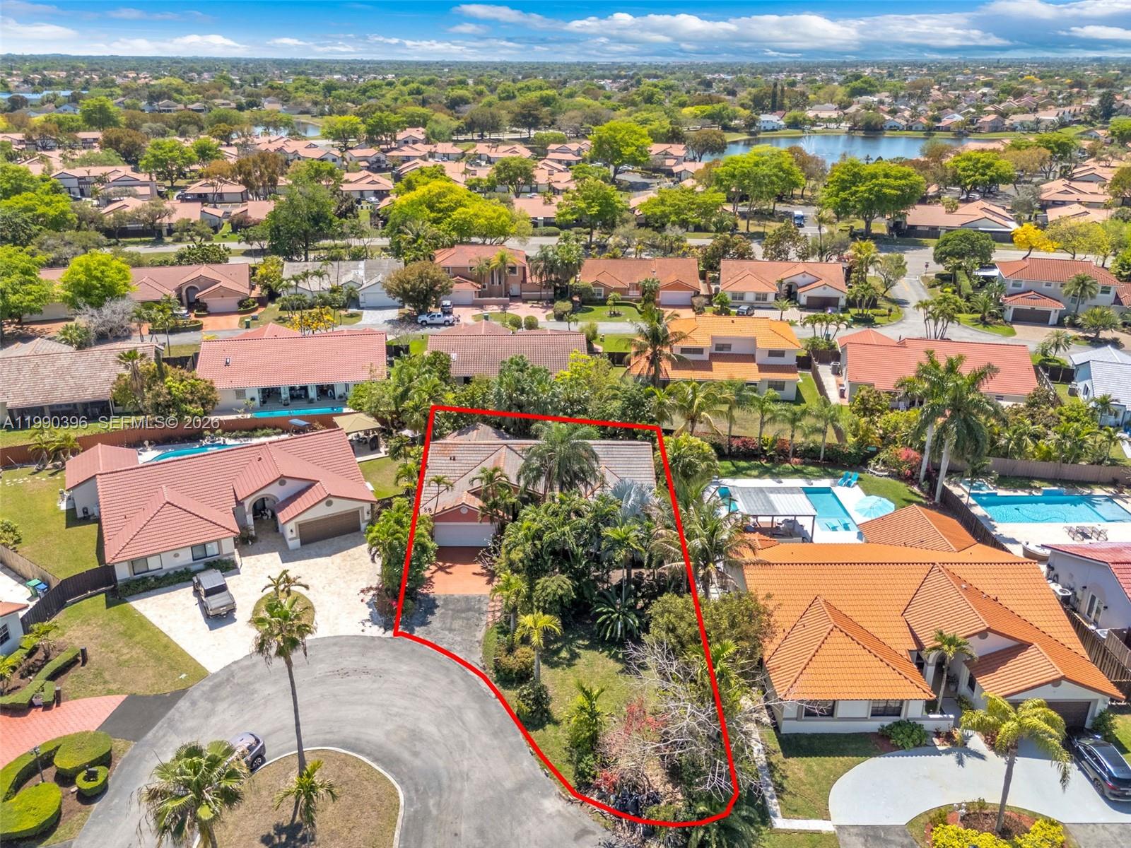 15012 Southwest 45th Lane Miami, FL 33185 - Photo 38 of 43 an aerial view of residential houses with outdoor space