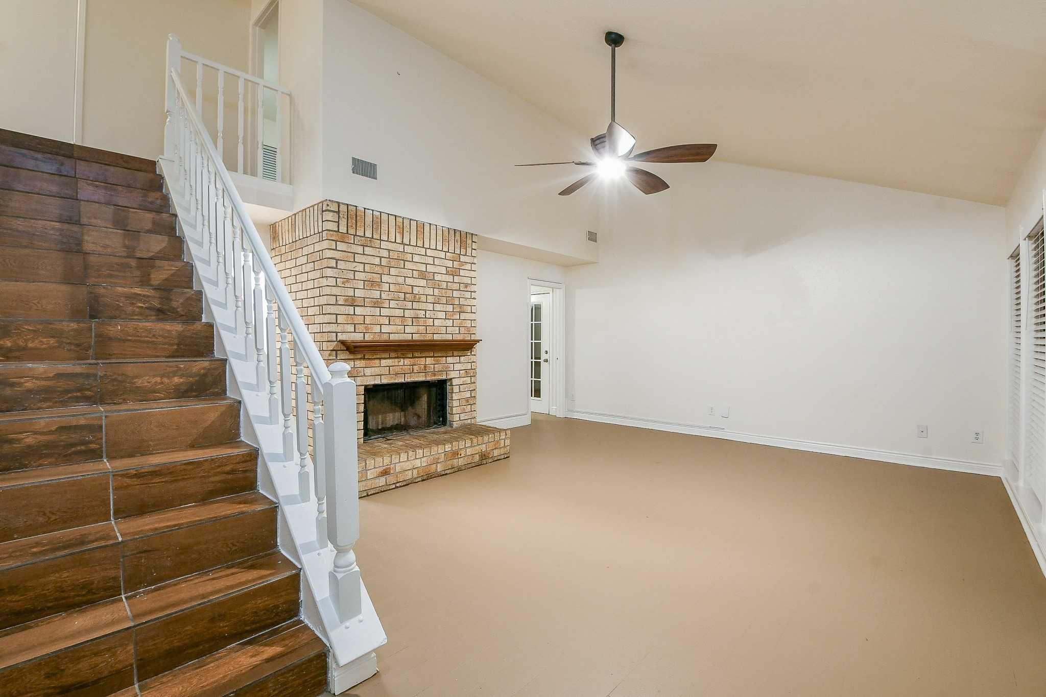 26 Yewleaf Road The Woodlands, TX 77381 - Photo 5 of 21 a view of entryway and hall with a front door