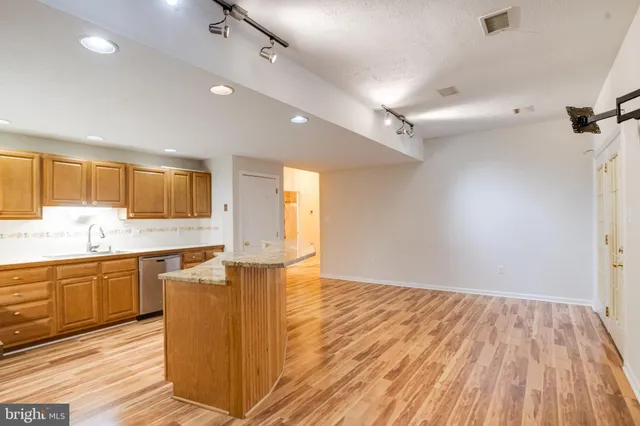 a bathroom with a sink and a shower