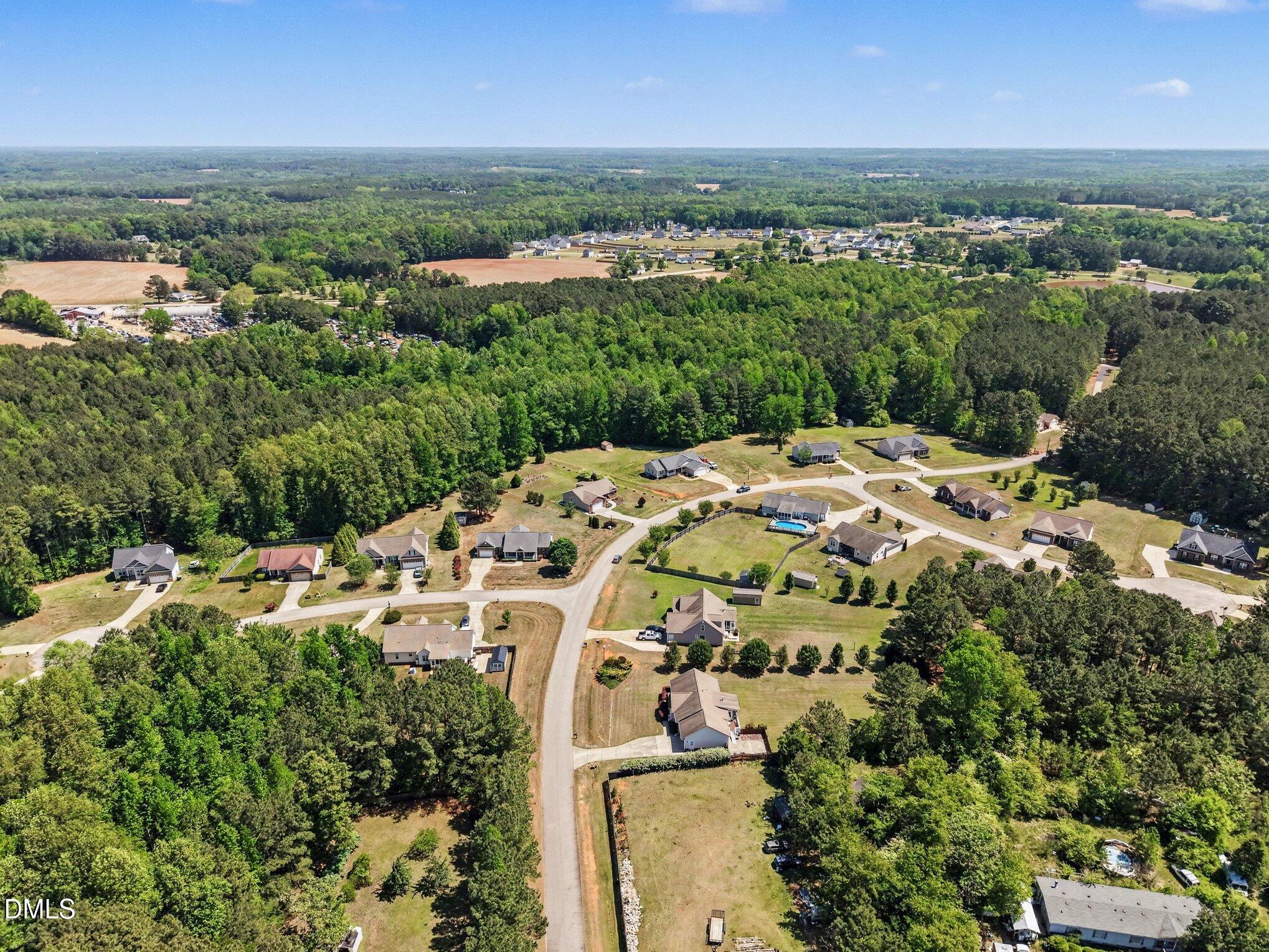 109 His Way Middlesex, NC 27557 - Photo 19 of 21 an aerial view of a house with a lake view