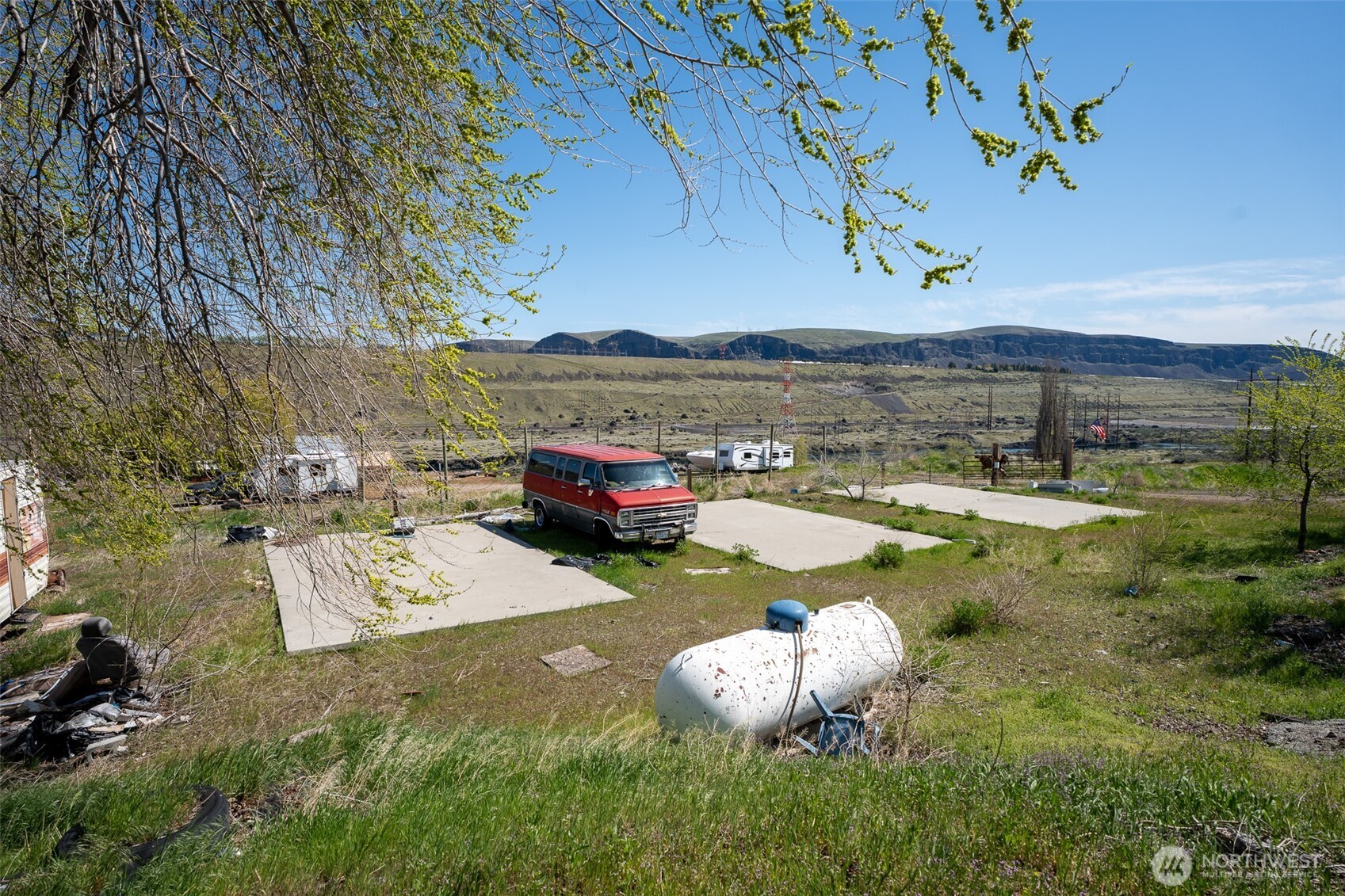 7199 Tarpiscan Road, Unit LOT 2 Malaga, WA 98828 - Photo 11 of 13 a view of a lake with a mountain