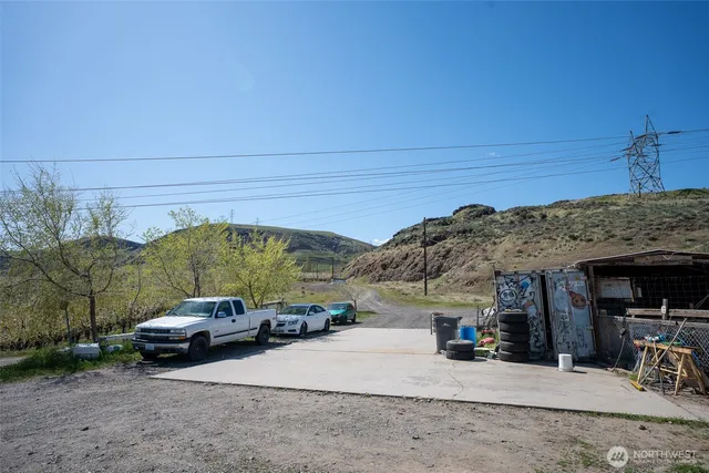 a view of a car parked on the side of the road