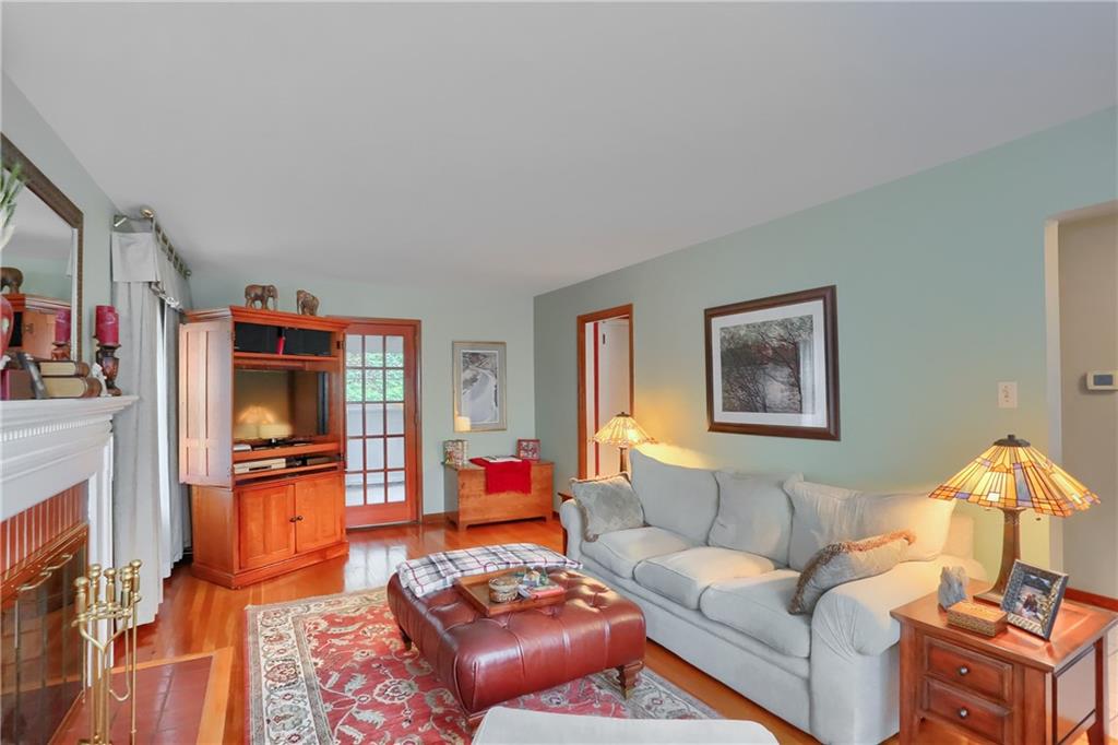 19 Marquette Road Pittsburgh, PA 15229 - Photo 14 of 38 a living room with furniture and a flat screen tv
