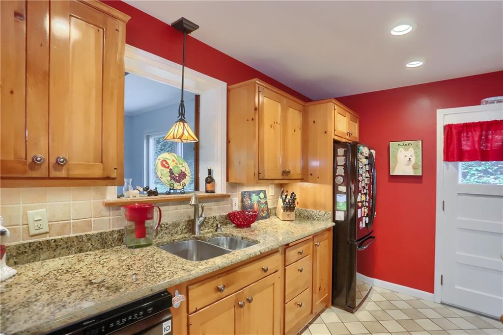 19 Marquette Road Pittsburgh, PA 15229 - Photo 18 of 38 a kitchen with a sink and cabinets