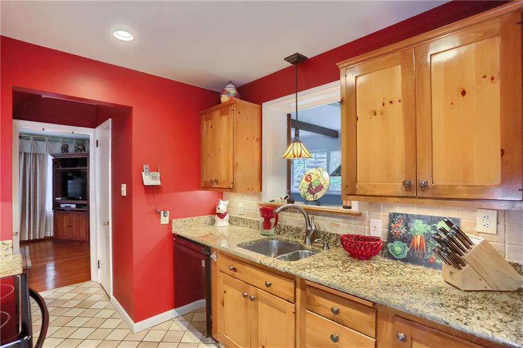 19 Marquette Road Pittsburgh, PA 15229 - Photo 21 of 38 a kitchen with granite countertop a sink and cabinets