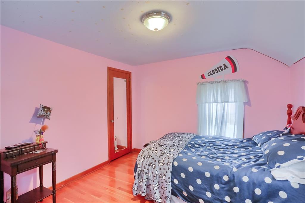 19 Marquette Road Pittsburgh, PA 15229 - Photo 36 of 38 a bedroom with a bed and a window