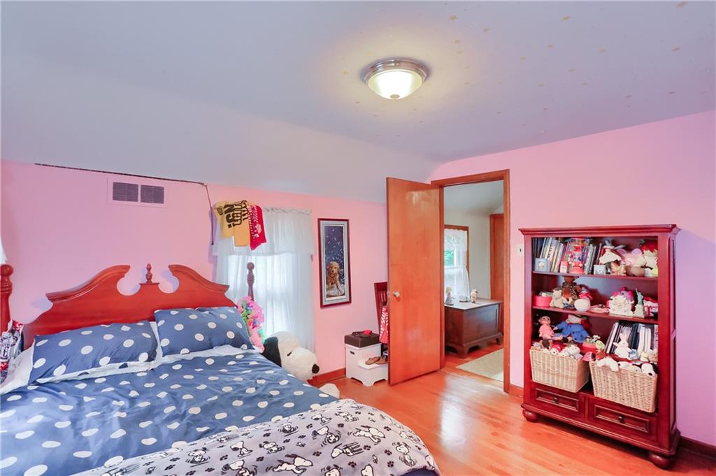 19 Marquette Road Pittsburgh, PA 15229 - Photo 37 of 38 a bedroom with a bed and a window