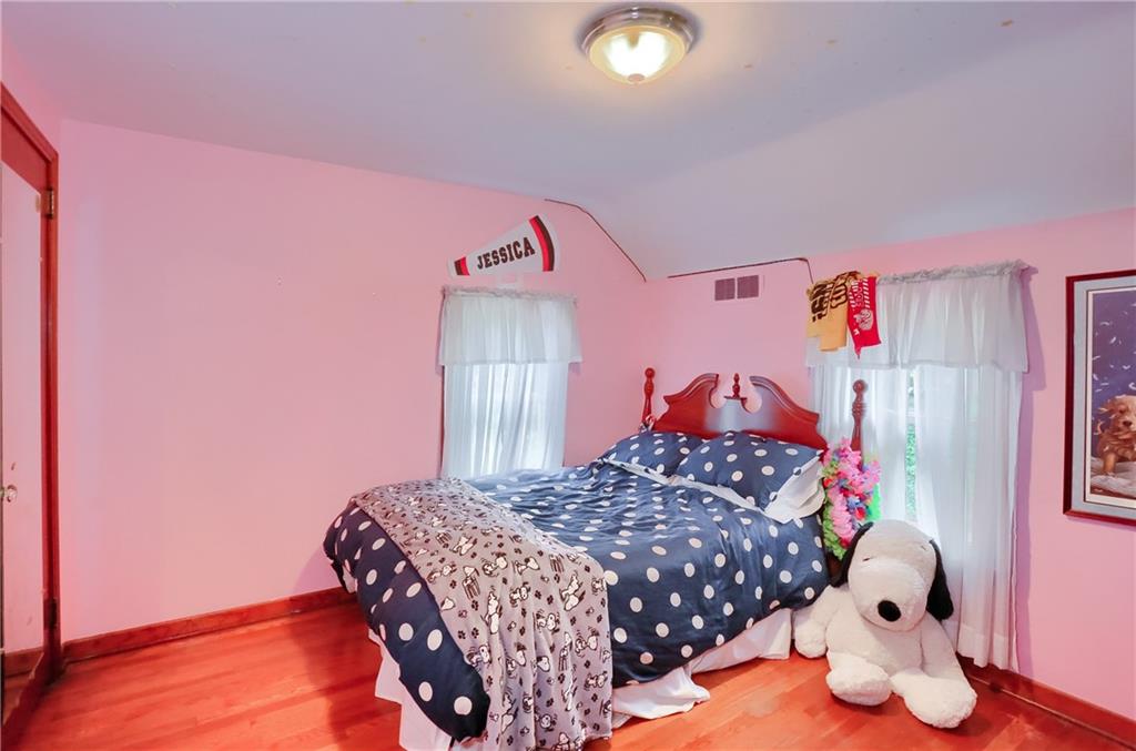 19 Marquette Road Pittsburgh, PA 15229 - Photo 38 of 38 a bedroom with a bed and a dresser