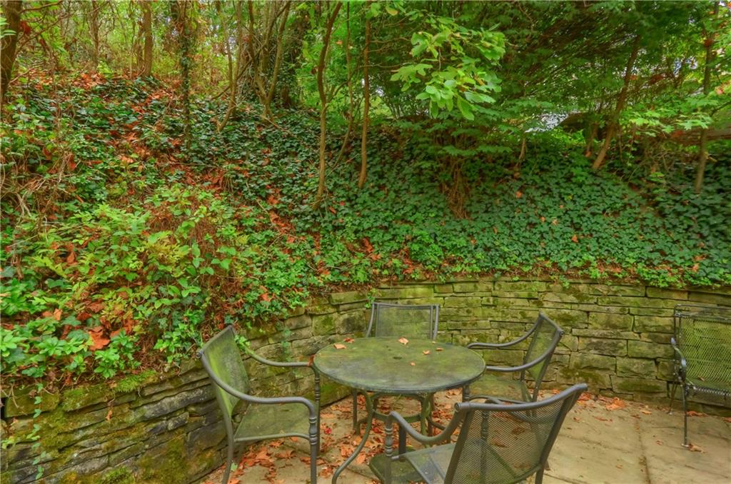 19 Marquette Road Pittsburgh, PA 15229 - Photo 6 of 38 a view of a backyard with table and chairs
