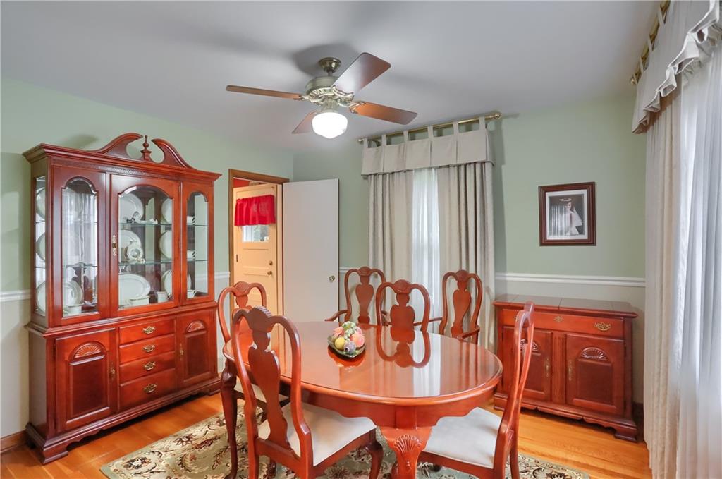 19 Marquette Road Pittsburgh, PA 15229 - Photo 10 of 38 a view of a dining room with furniture window and wooden floor