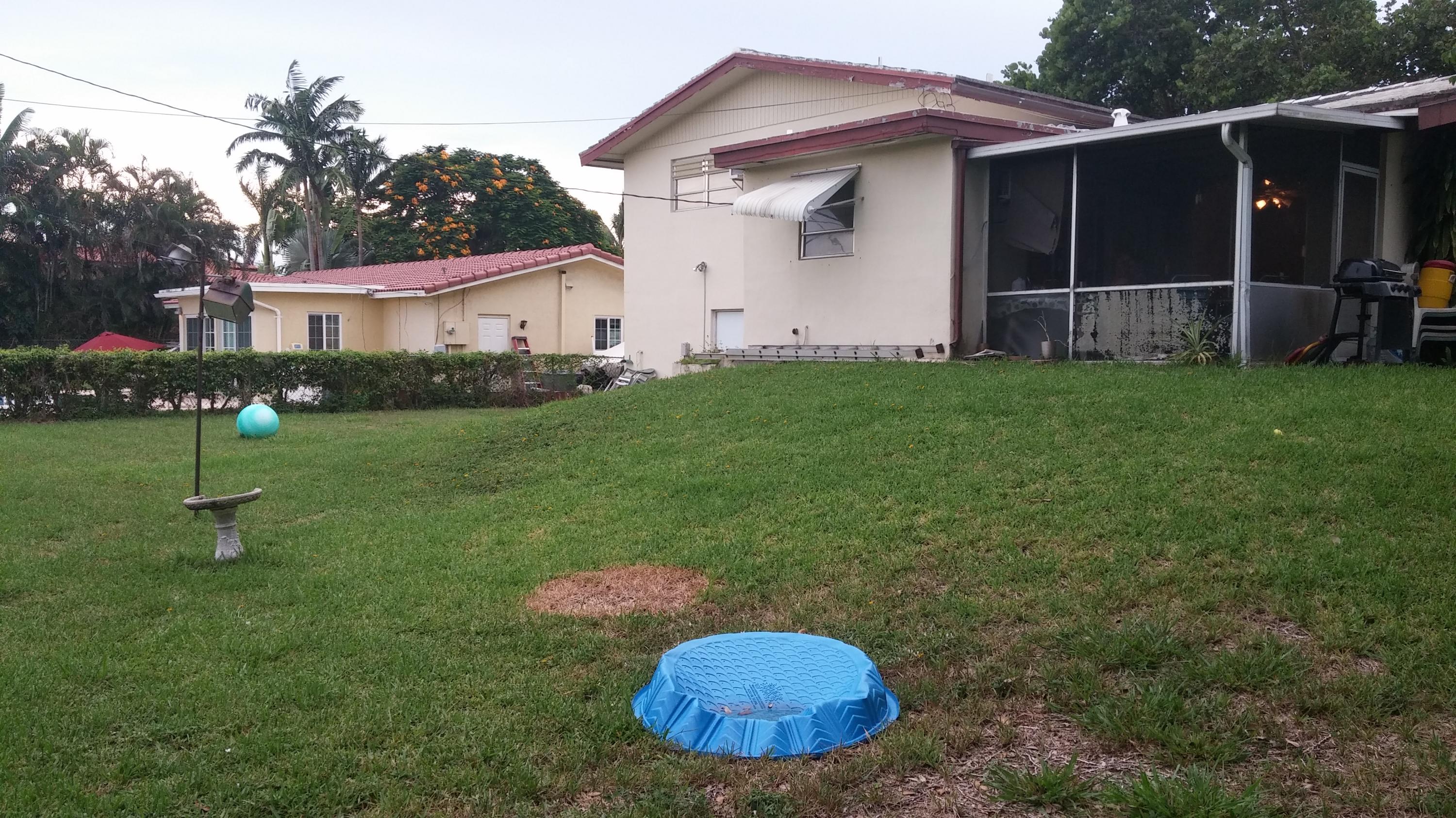 640 Northwest 16th Avenue Boca Raton, FL 33486 - Photo 4 of 5 a view of a house with backyard