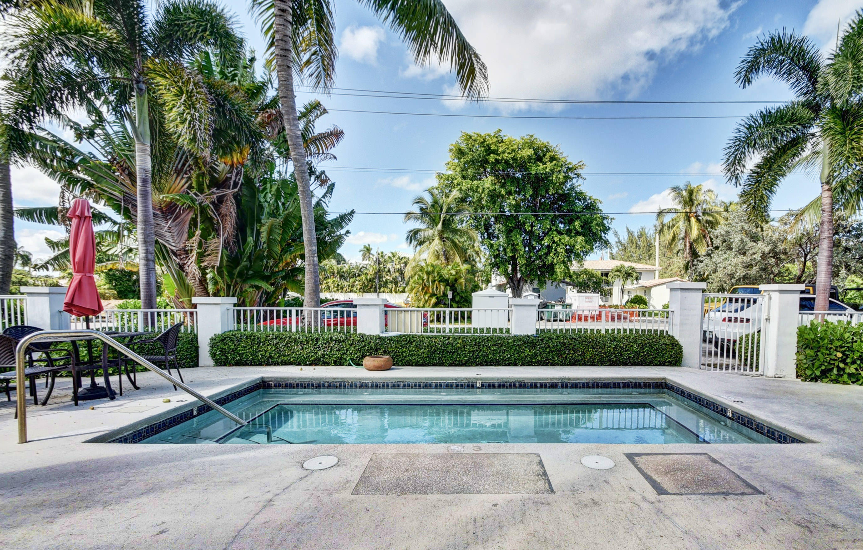 1020 Casuarina Road Delray Beach, FL 33483 - Photo 15 of 17 a view of backyard with outdoor seating and green space
