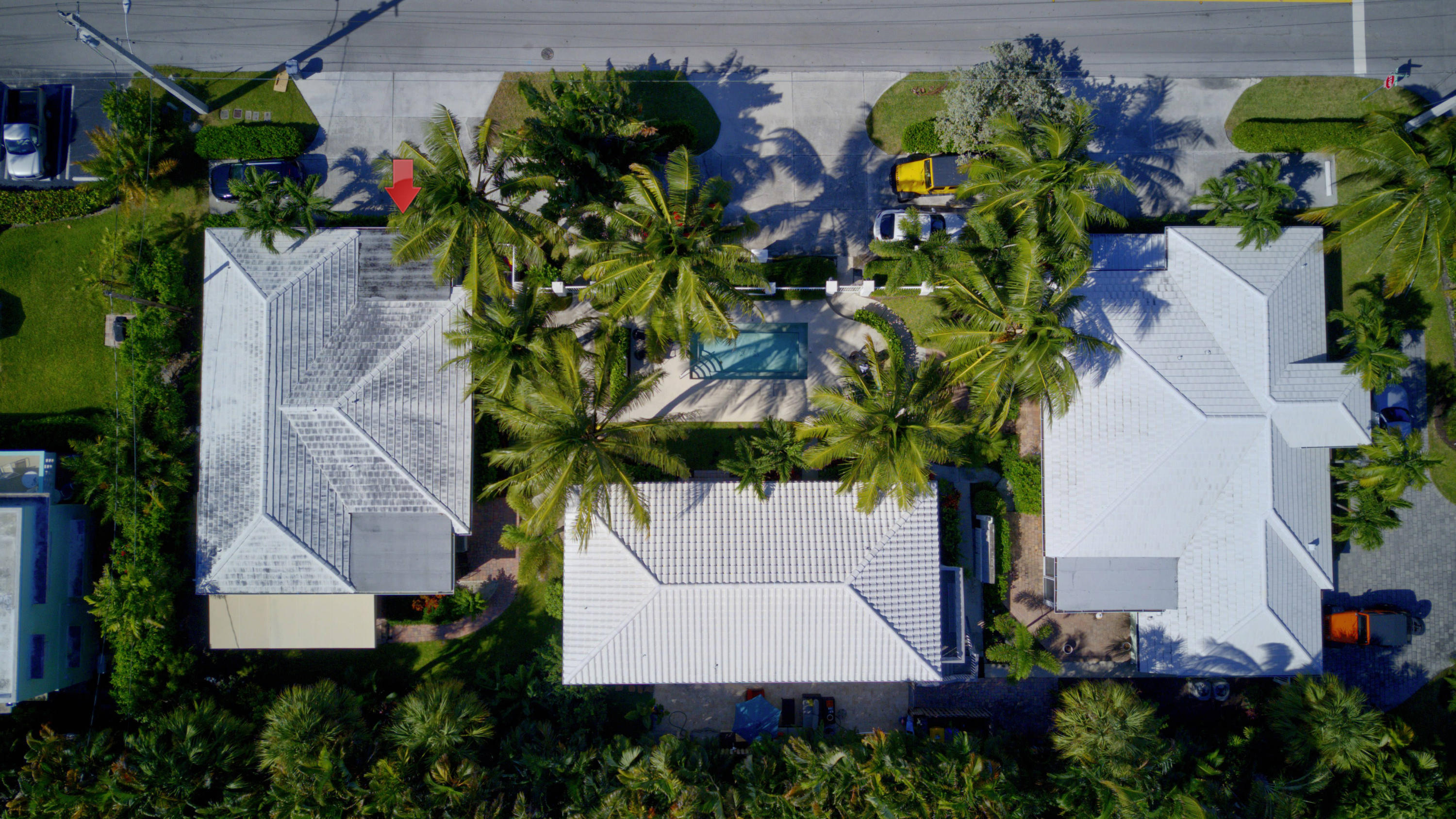 1020 Casuarina Road Delray Beach, FL 33483 - Photo 16 of 17 an aerial view of a house with a yard and garden