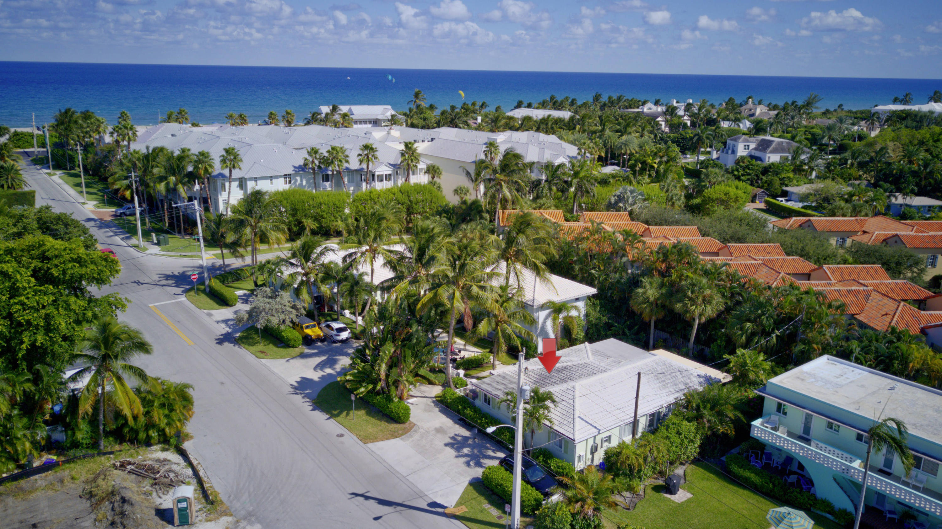 1020 Casuarina Road Delray Beach, FL 33483 - Photo 2 of 17 an aerial view of a house with a yard and lake view