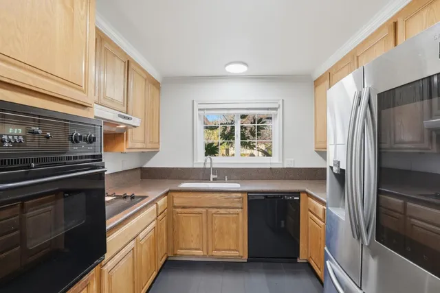 a bathroom with a shower and a sink