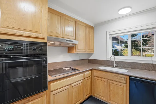 a bathroom with a sink and a window