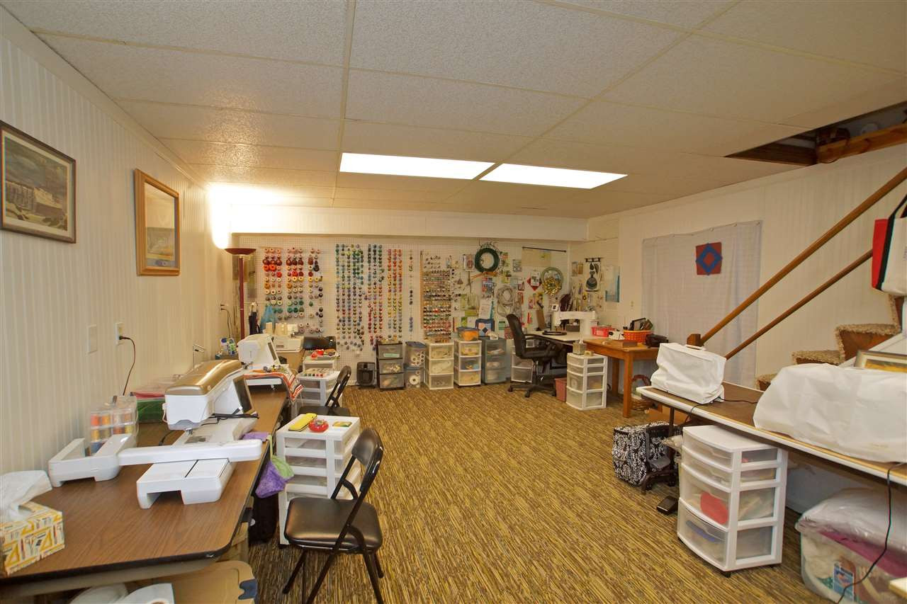 9449 Ferrell Road Zebulon, NC 27597 - Photo 24 of 28 Many uses, home office, craft room, storage. Basement