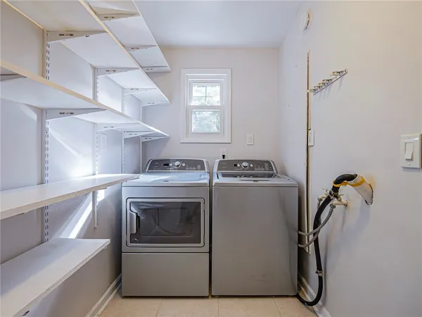 a view of a room with washer and dryer