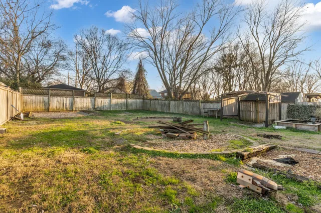 a view of a yard with a slide