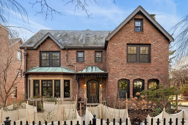 a front view of a house with glass windows