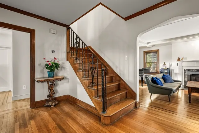 a view of livingroom with wooden floor and furniture