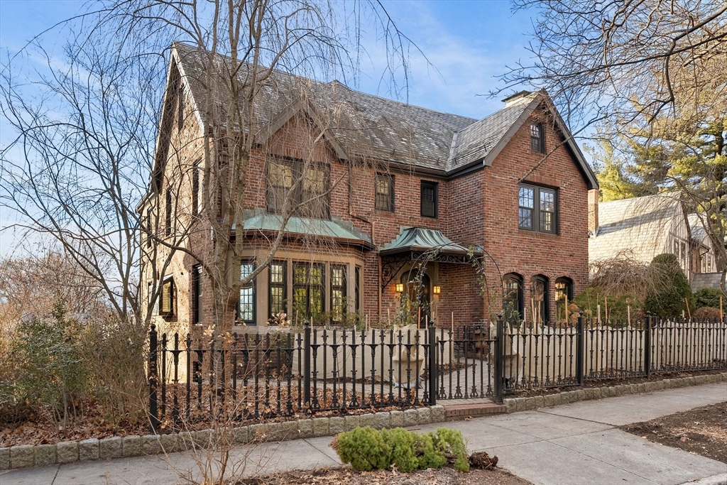 96 Gardner Road, Unit 96 Brookline, MA 02445 - Photo 2 of 42 a front view of a house with a yard