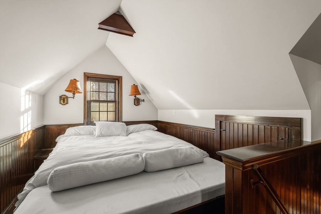 96 Gardner Road, Unit 96 Brookline, MA 02445 - Photo 36 of 42 a bedroom with a bed and a window