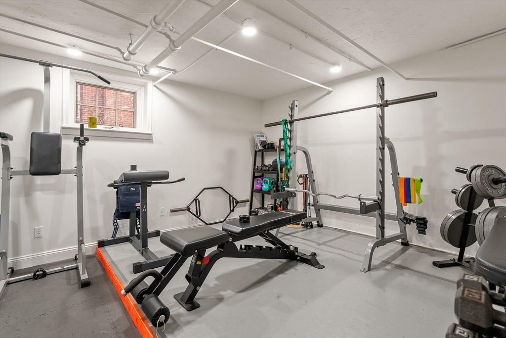 96 Gardner Road, Unit 96 Brookline, MA 02445 - Photo 40 of 42 a view of a room with gym equipment