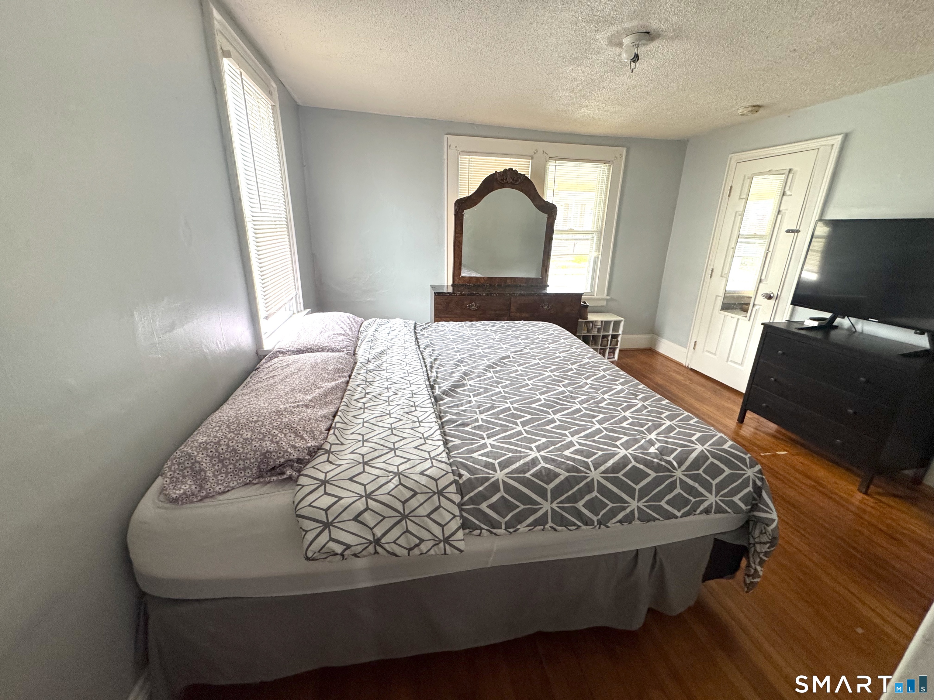 6-8 Vose Street Ansonia, CT 06401 - Photo 14 of 37 Bedroom 2. Far end door leads into front entrance foyer.